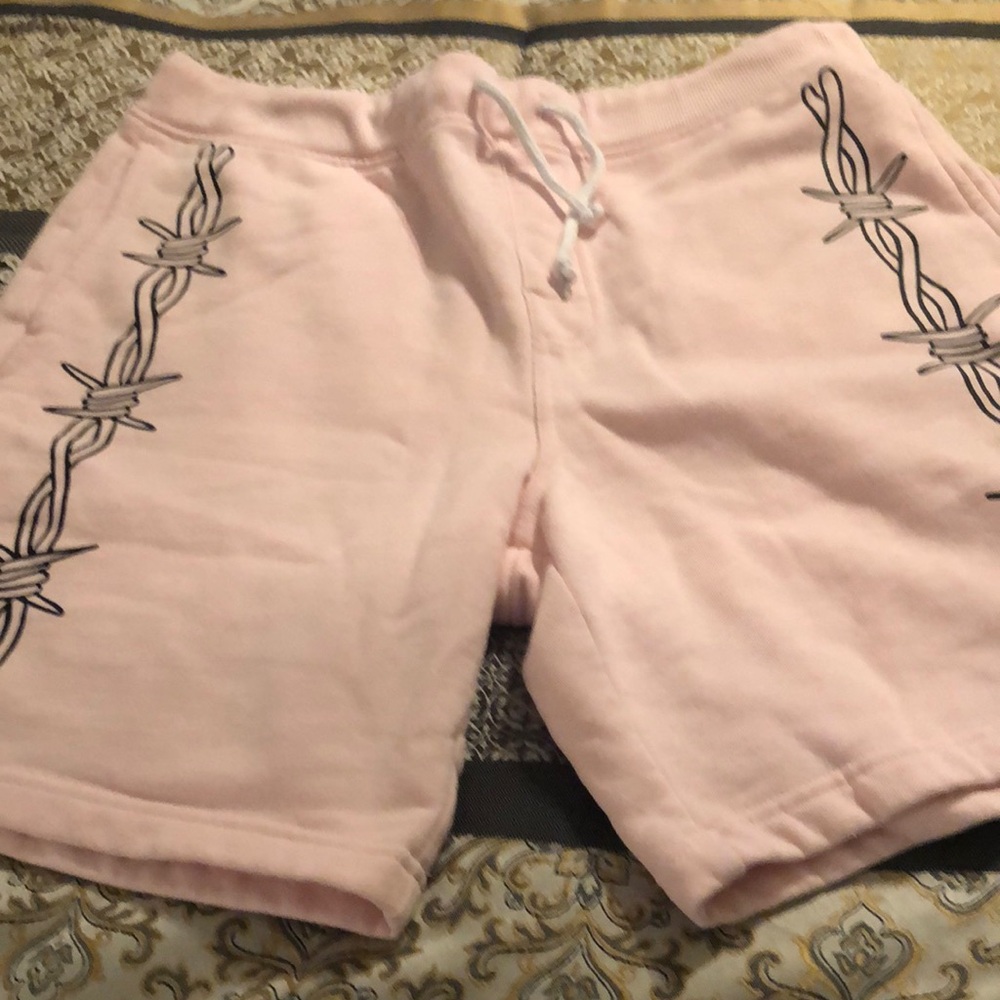 Pink Athletic Shorts with Embroidered Floral Design